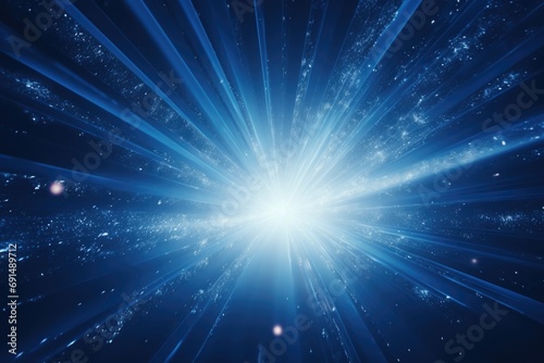 Abstract glowing blue light effect with sparkling rays