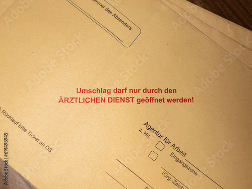 Confidentiality notice on an envelope in German language. The letter may only be opened by the medical service of the employment agency in Germany. Health related documents are protected.
