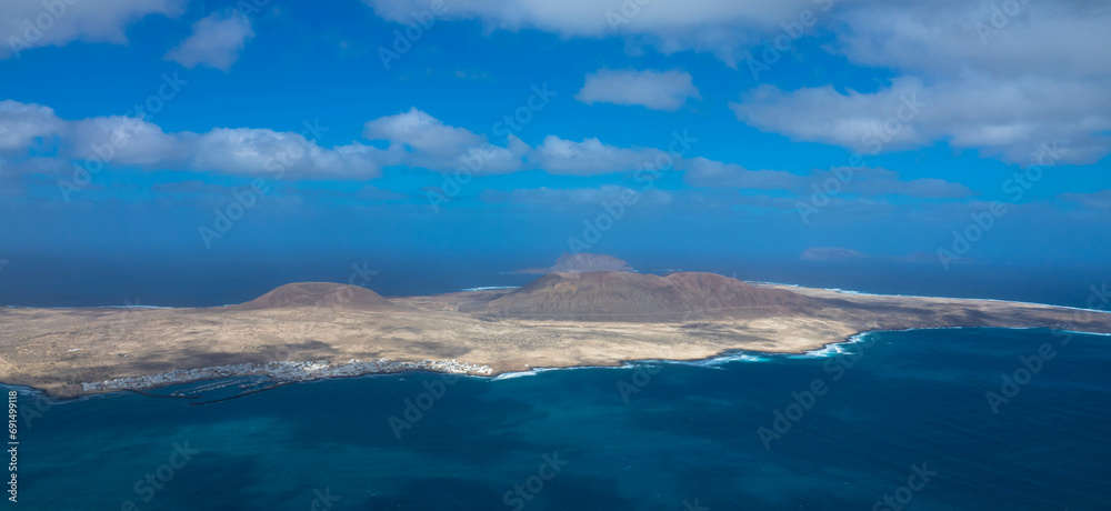 Spectacular Panorama view of the small island of La Graciosa. Seen from the Mirador del Rio on Lanzarote. 
Spain, Europe