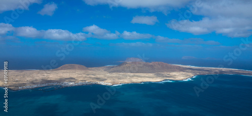 Spectacular Panorama view of the small island of La Graciosa. Seen from the Mirador del Rio on Lanzarote. Spain, Europe