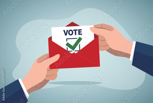 Hand is showing red envelope with vote.