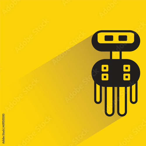 cute robot with shadow on yellow background