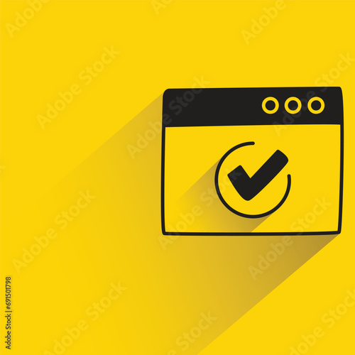 web and check mark with shadow on yellow background