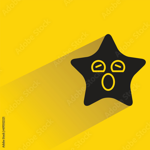 amazed star emoji with shadow on yellow background