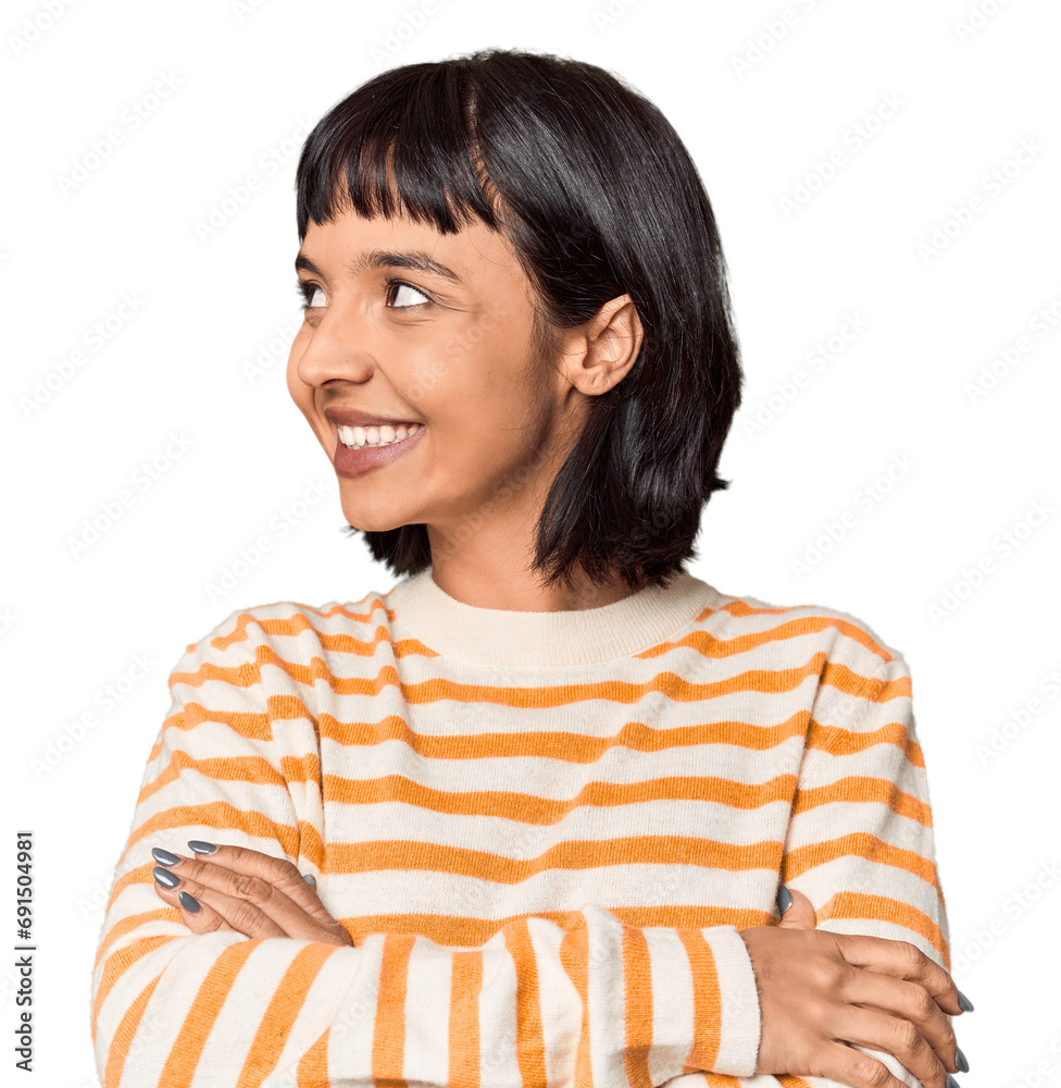 Young Hispanic woman with short black hair in studio smiling confident with crossed arms. Young Hispanic woman with short black hair in studio smiling confident with crossed arms.