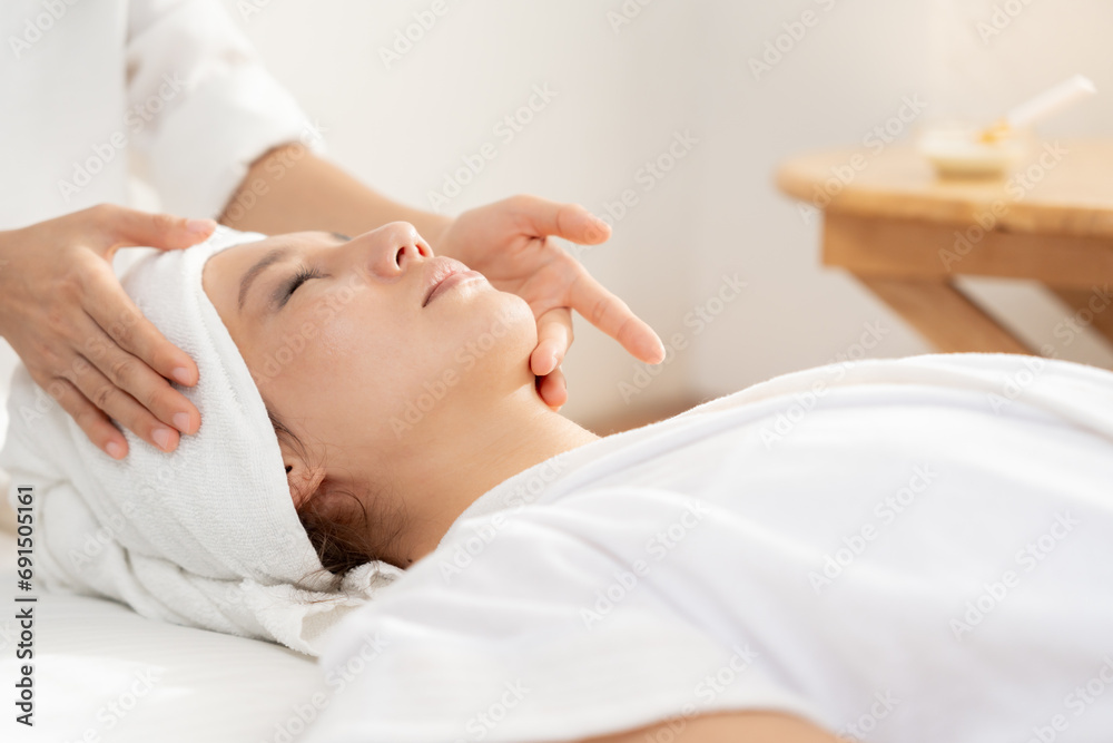 Beautiful women are receive therapy massage and treatment to face, restore pores, reduce wrinkles, lift and tighten, beautify, enjoy, relax, and baby face. excursive, recreation, dermatology Beautiful women are receive therapy massage and treatment to face, restore pores, reduce wrinkles, lift and tighten, beautify, enjoy, relax, and baby face. excursive, recreation, dermatology