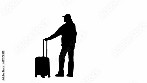 Portrait of traveler isolated on white background alpha channel. Silhouette of woman standing with suitcase and looking at the flights board.