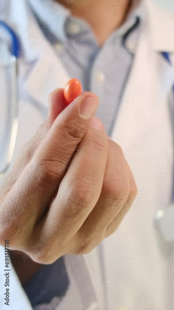 Watch a doctor holding pills in hand, signaling a thumbs-down gesture, emphasizing caution in medical choices. This video serves as a visual representation of careful decision-making and encourages Watch a doctor holding pills in hand, signaling a thumbs-down gesture, emphasizing caution in medical choices. This video serves as a visual representation of careful decision-making and encourages