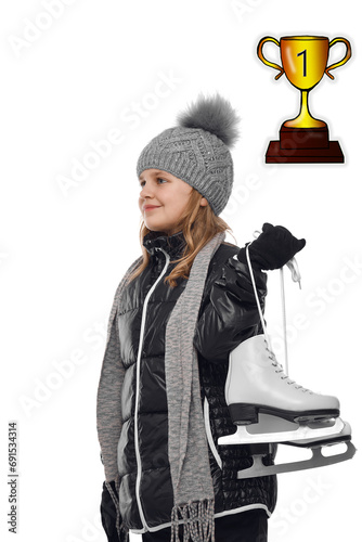 A teenage girl in outerwear with white skates in her hands dreams of winning a figure skating competition. Junior athlete dreams of winning the World Championships. photo