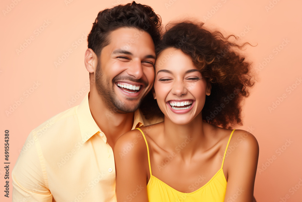 Joyful good looking pair posing for a glowing portrait Joyful good looking pair posing for a glowing portrait