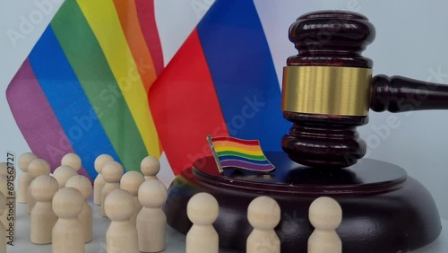 Russian flag and LGBT flag. Problem of the rights of sexual minorities in country in Russia and ban photo