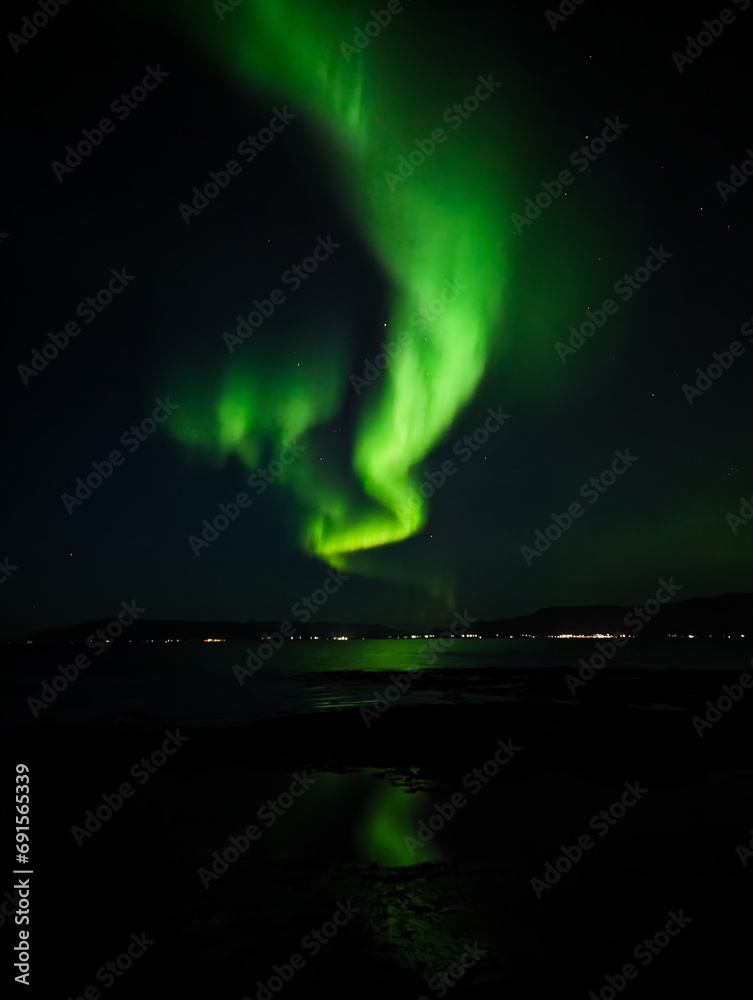 Northern Lights above Reykjavik 
