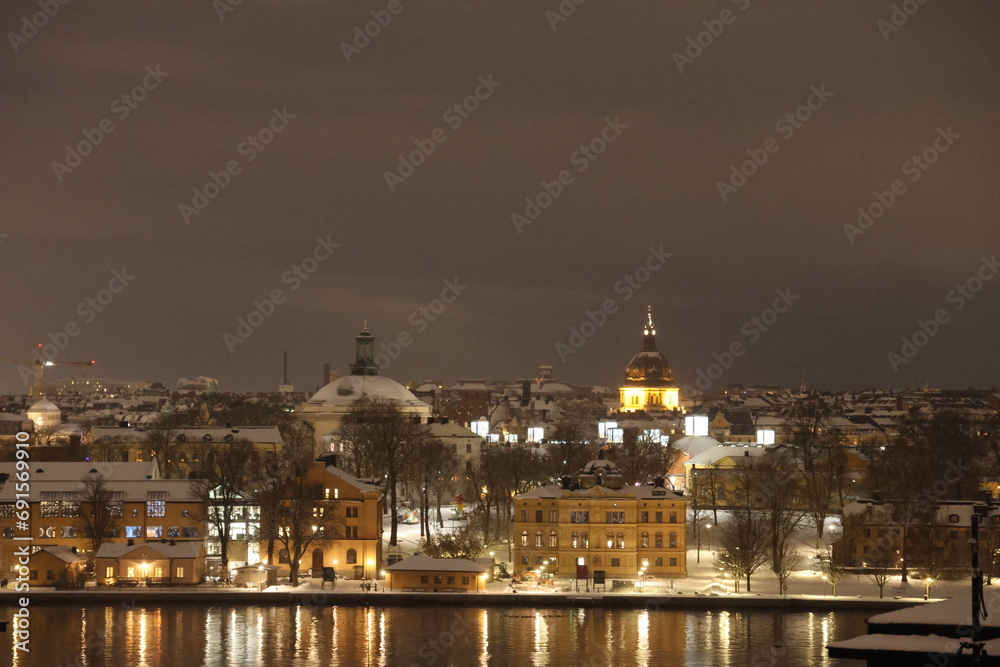 Stockholm City Center Winter photo from Fjällgatan towards Skeppsholmen. Lights are on GoranOfSweden