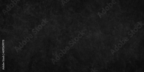 Scary Wall Black Stone Concrete Texture with scratches, the Color black a gloomy background with textured wall, floor or old grunge backdrop, vintage distressed grunge texture with grainy stains.
