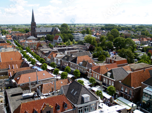 View from the church in the city Breezand, showing a market that is going on photo