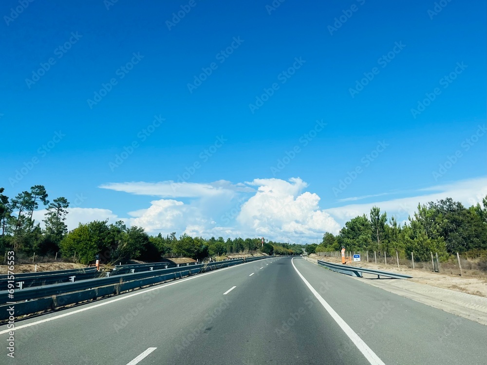 Empty highway, summertime, empty road, blue sky Empty highway, summertime, empty road, blue sky