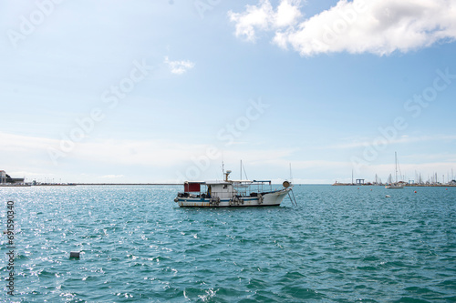 Fishing boat standing on the seashore