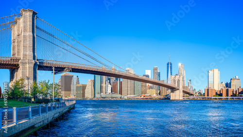 the skyline of new york under a blue sky