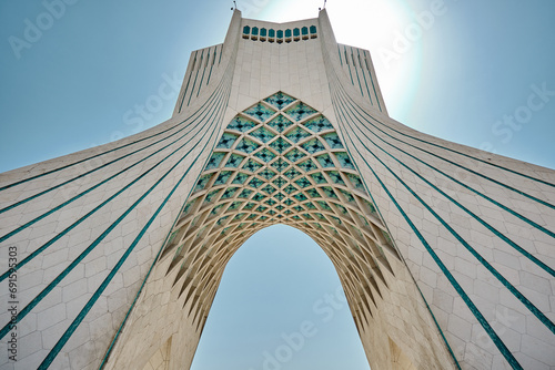 Tehran, Azadi Tower in Iran, tower of freedom or liberty low angle view. photo