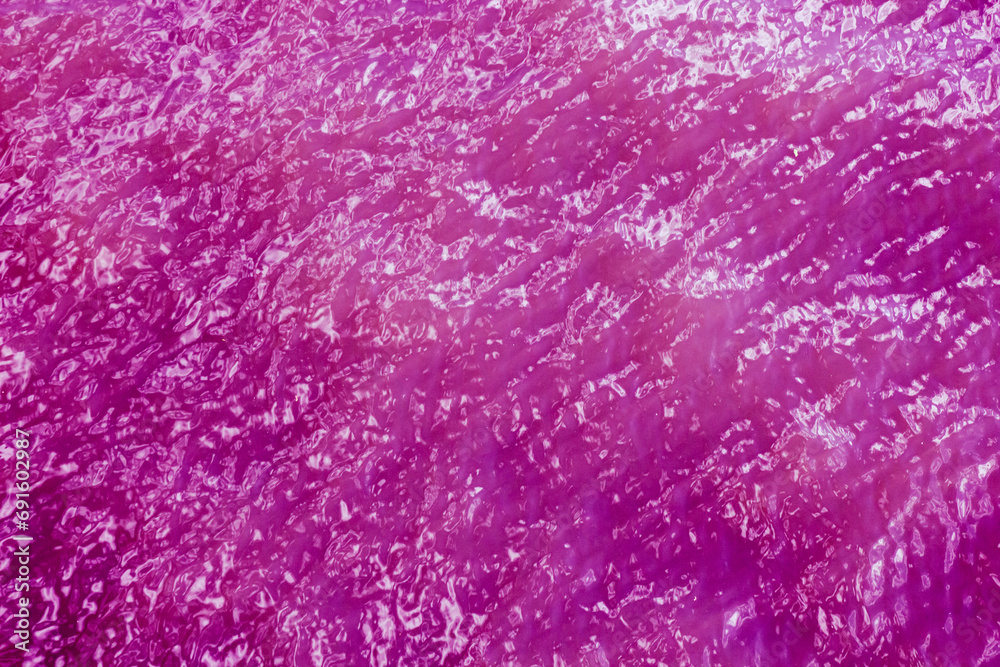 Abstract wavy liquid pink background with reflections