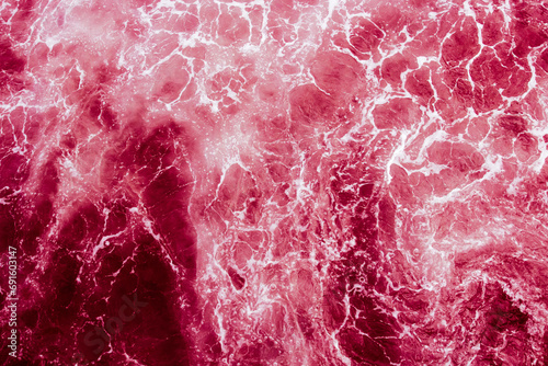 Bright red with white veins abstract background, looks like the atmosphere of a space planet or galaxy