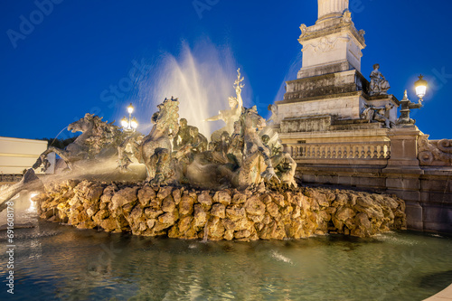 Place des Quinconces and Girondins fountain monument at night, Bordeaux, Aquitaine, France. High quality photo