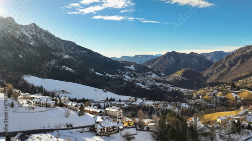 Aerial view of Riso valley and Zambla town,background Orobie alps, Lombardy, Italy