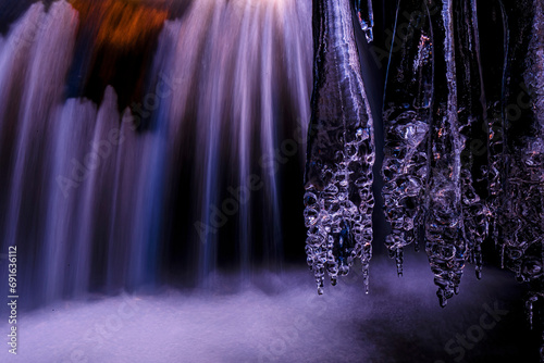 Icy Veil Over Mountain Cascade
