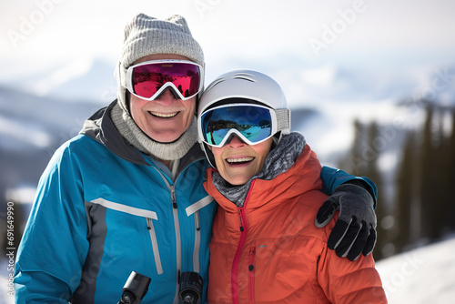 Happy retired couple skiingHappy retired couple skiing photo