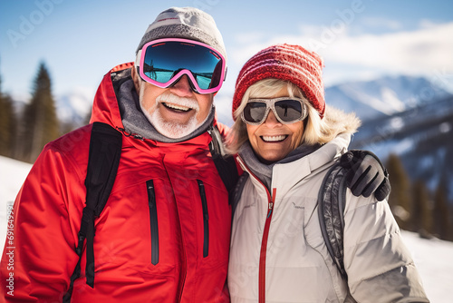 Happy retired couple skiingHappy retired couple skiing