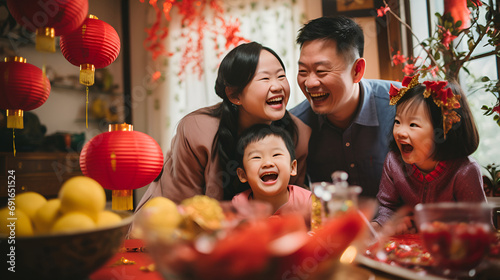 A family with children celebrates Chinese New Year at home