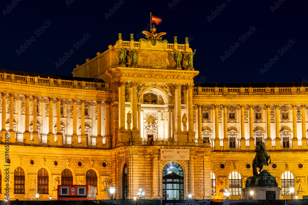 Hofburg palace on Heldenplatz square at night, Vienna, Austria