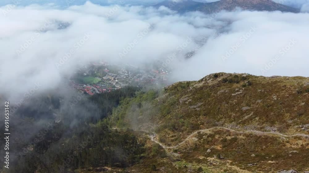 Bergen Hidden Beneath the Clouds, Ulriken Mountain - Norway 2.7K Aerial Footage Bergen Hidden Beneath the Clouds, Ulriken Mountain - Norway 2.7K Aerial Footage