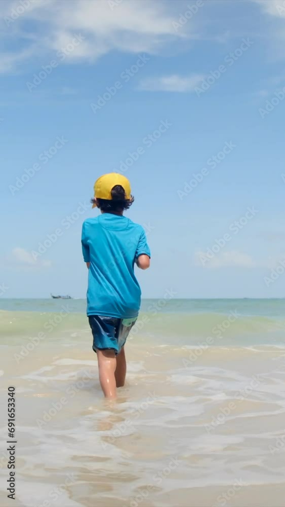 sun-soaked scenes of children reveling in the playful embrace of summer. This dynamic video captures the vibrant hues and lively activities along the shoreline, offering a visual feast of joy and laug sun-soaked scenes of children reveling in the playful embrace of summer. This dynamic video captures the vibrant hues and lively activities along the shoreline, offering a visual feast of joy and laug