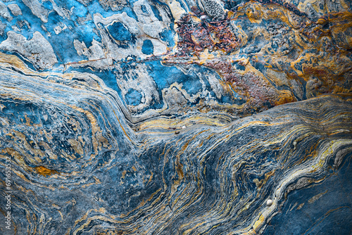 Abstract patterns of naturally weathered rock formations photo