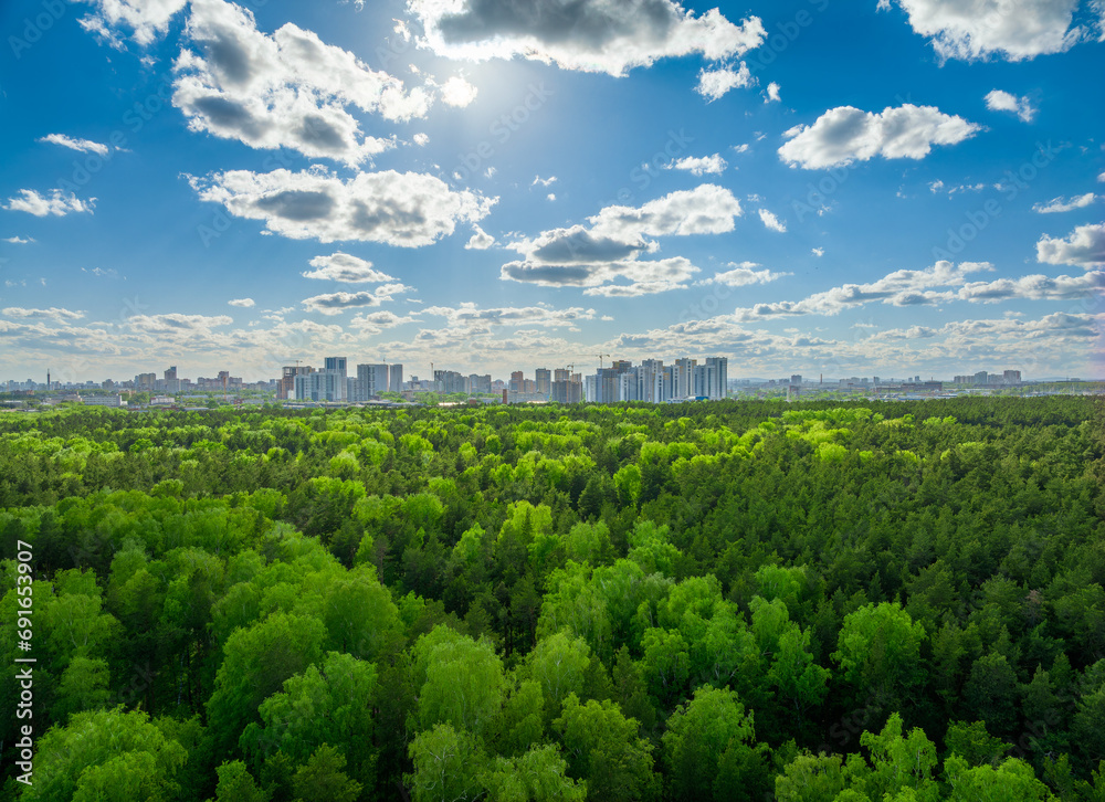 Yekaterinburg aerial panoramic view in summer sunset. Ekaterinburg is the fourth largest city in Russia located in the Eurasian continent on the border of Europe and Asia.