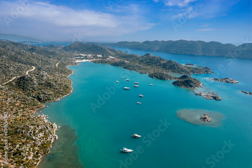 Boats in the bay of Kekova village (Ücagiz) viewed from the drone. Kekova island in Antalya province of Turkey.