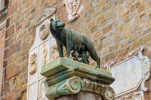Capitoline Wolf, bronze sculpture of the mythical she-wolf suckling the infant twins Romulus and Remus, in Rome, Italy. Scene from the legend of the founding of Rome photo