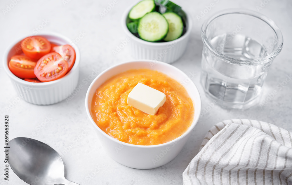 Cooked sweet potato puree in a bowl Cooked sweet potato puree in a bowl
