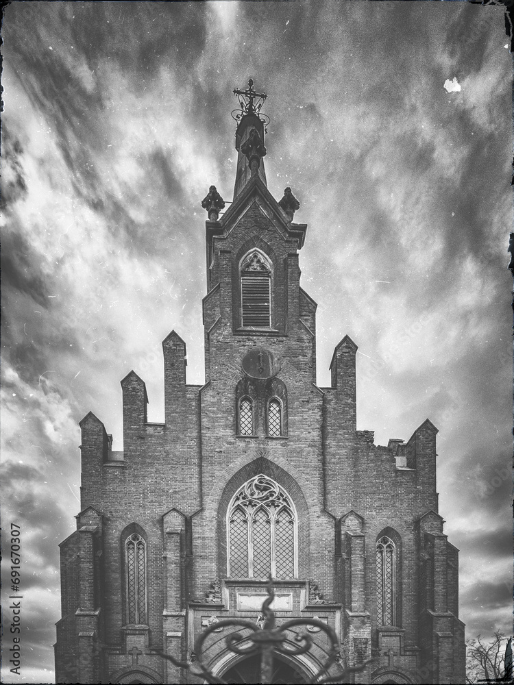 black and white photo of facade of cathedral in vintage style black and white photo of facade of cathedral in vintage style