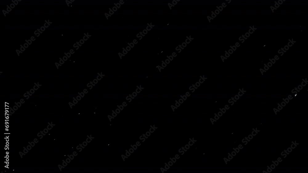Dust Particles Floating On Black Background. Dynamic Dust Particles Randomly Float In Space. Glittering Dust Particles With Bokeh on 4K Slow motion. Dust Particles Floating On Black Background. Dynamic Dust Particles Randomly Float In Space. Glittering Dust Particles With Bokeh on 4K Slow motion.