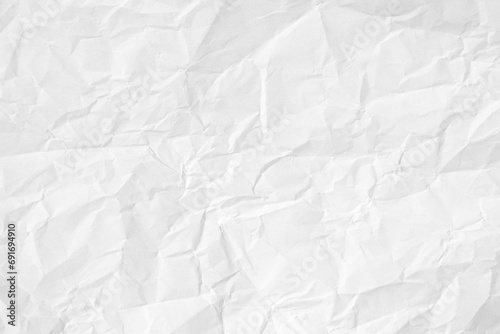 White sheet of wrinkled paper. Texture of crumpled paper. Innovative business idea. Paper Texture Background. Textured Paper. Paper Background. Graphic elements. Photography.