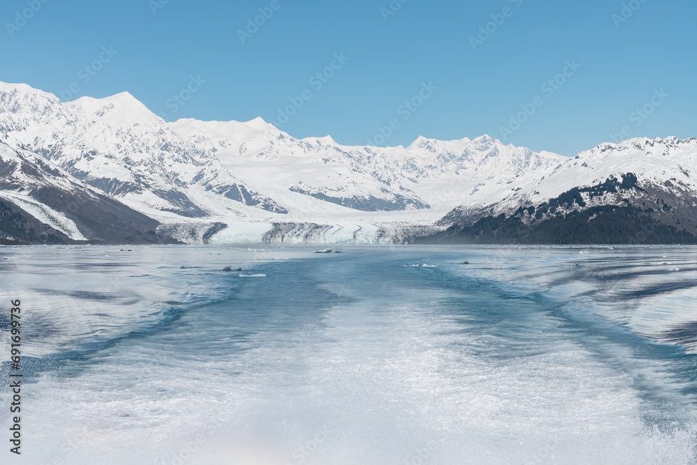 Harvard Tidewater Glacier at the end of College Fjord with the boat wake in the foreground, Alaska, USA