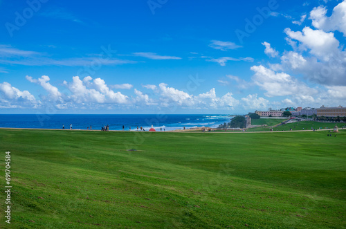 Background of beautiful meadow in Old San Juan, Puerto Rico. This area in front of Castillo San Felipe Del Morro or El Morro is set for public. A significant political, iconic, historic location photo