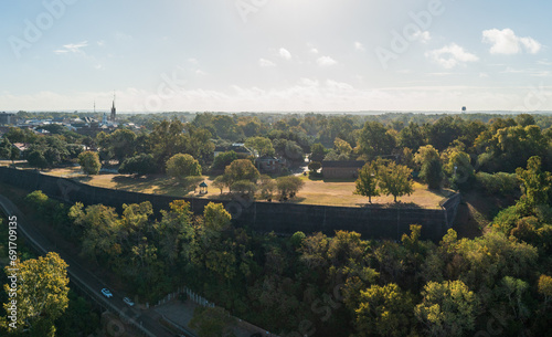 Grounds of mansion in cityscape of Natchez in Mississippi from aerial viewpoint