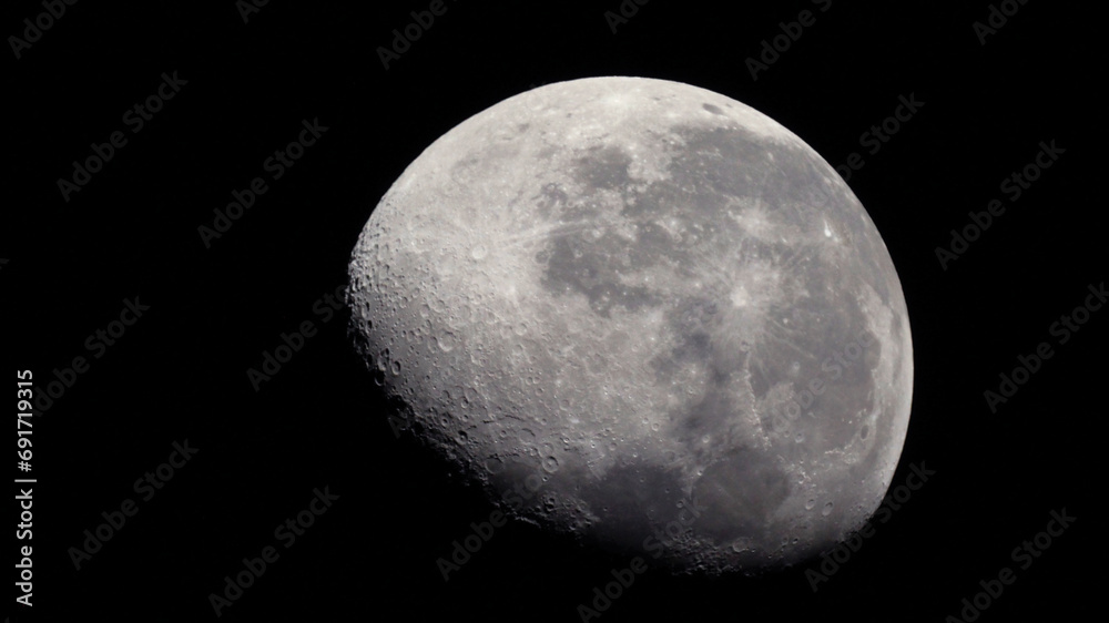 Fototapeta premium Close up of waxing gibbous moon
