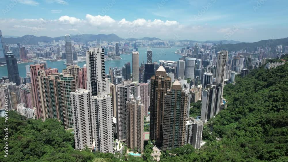 City Aerial in The Peak Central Admiralty Wan Chai Causeway Bay Hong Kong Island and Kowloon Tsim Sea Tsui ,4K drone shot of the residential and commercial area within financial business City Aerial in The Peak Central Admiralty Wan Chai Causeway Bay Hong Kong Island and Kowloon Tsim Sea Tsui ,4K drone shot of the residential and commercial area within financial business