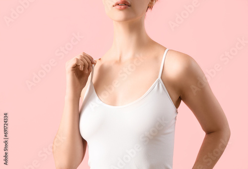 Young woman in white top on...