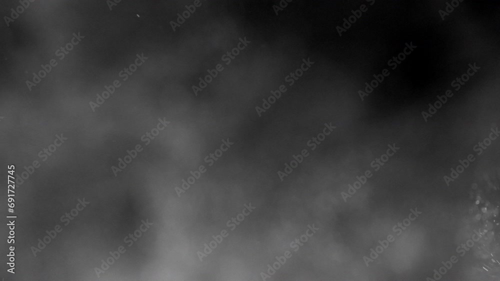 Dust Particles Floating On Black Background. Dynamic Dust Particles Randomly Float In Space. Glittering Dust Particles With Bokeh on 4K Slow motion. Dust Particles Floating On Black Background. Dynamic Dust Particles Randomly Float In Space. Glittering Dust Particles With Bokeh on 4K Slow motion.