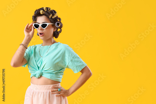 Shocked young woman with ha...